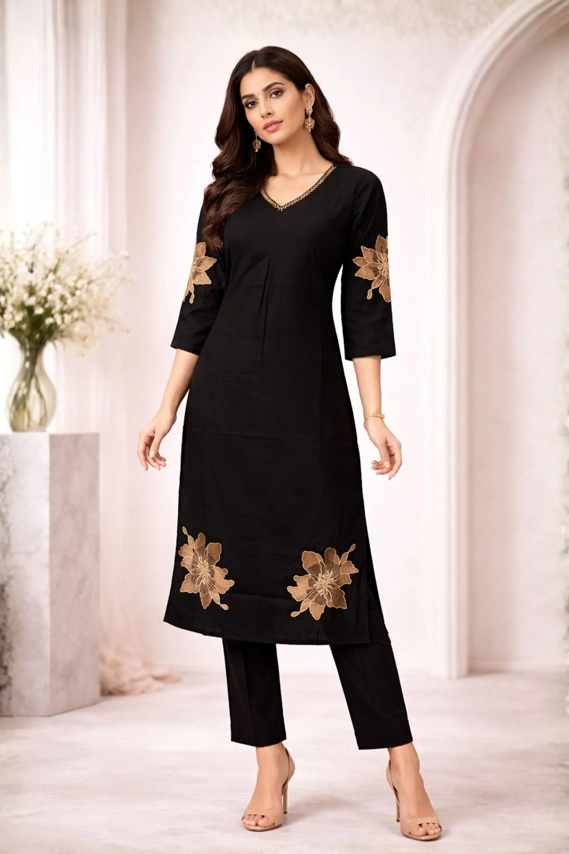 Black floral embroidered co-ord set for women, featuring a cropped top and matching wide-leg pants with intricate embroidery.