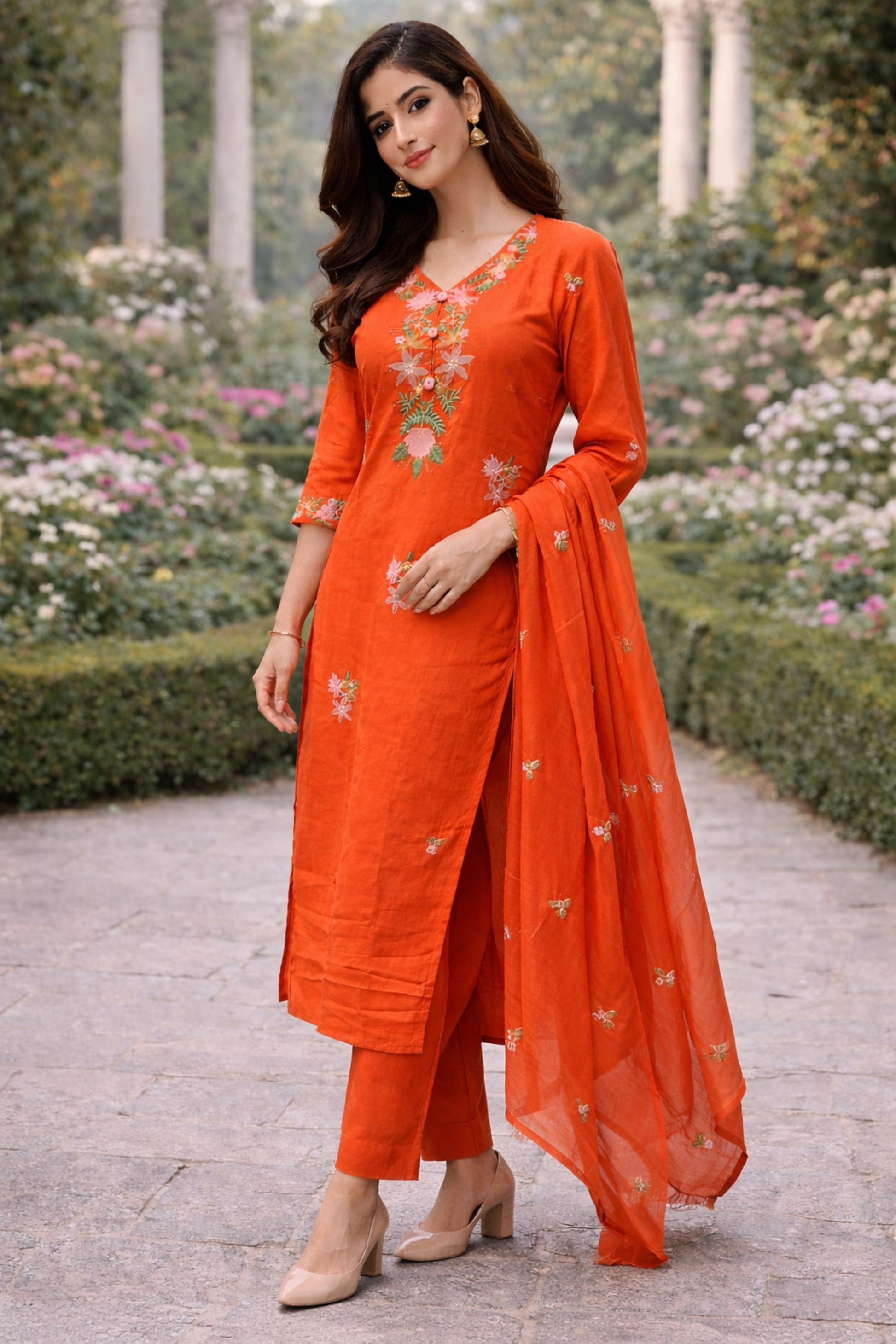 Rust floral embroidered three-piece suit set for women, featuring a jacket, pants, and top.