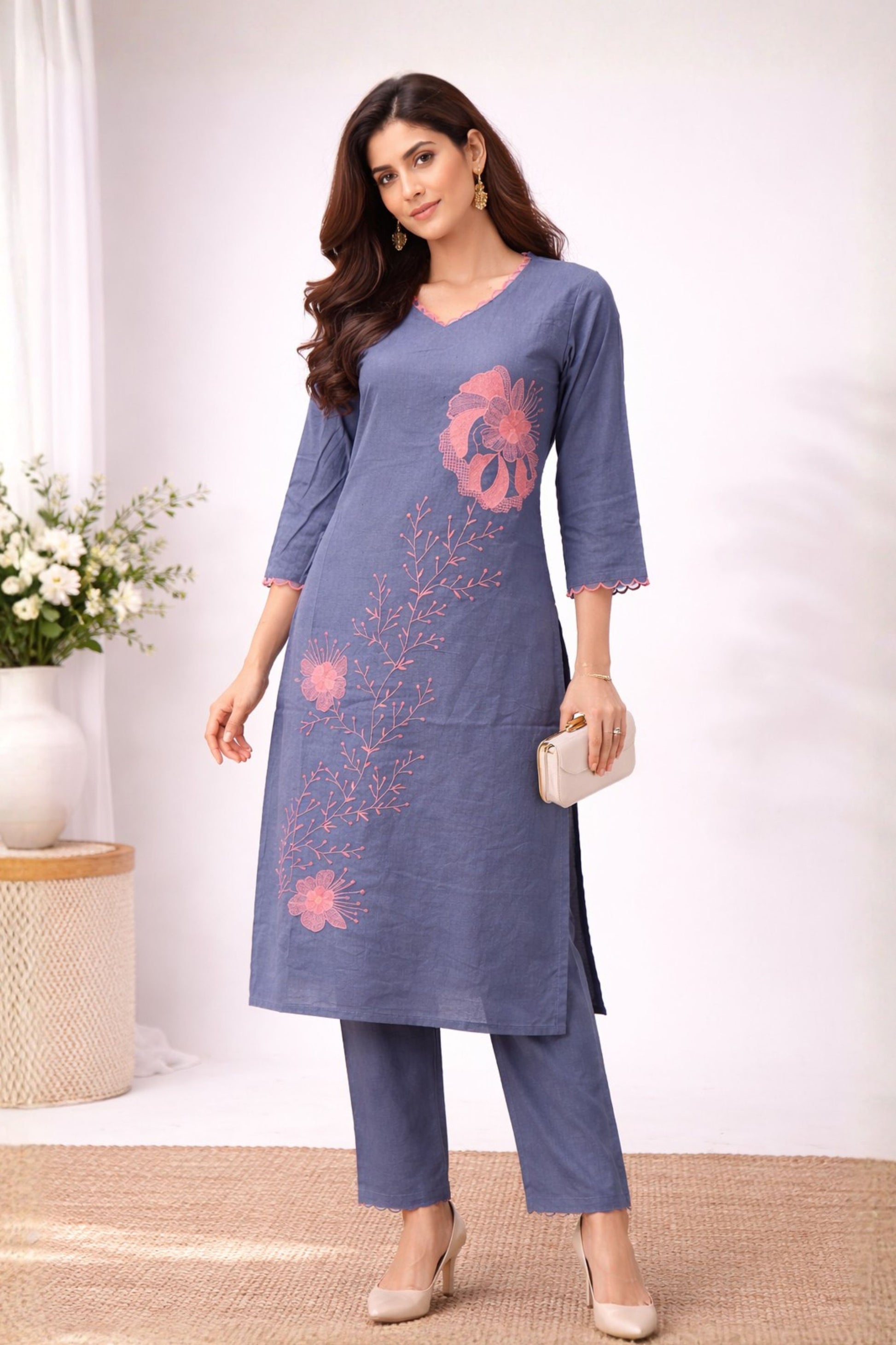 Dusty blue embroidered co-ord set featuring a flowing kurta and matching trousers, showcasing intricate floral patterns.