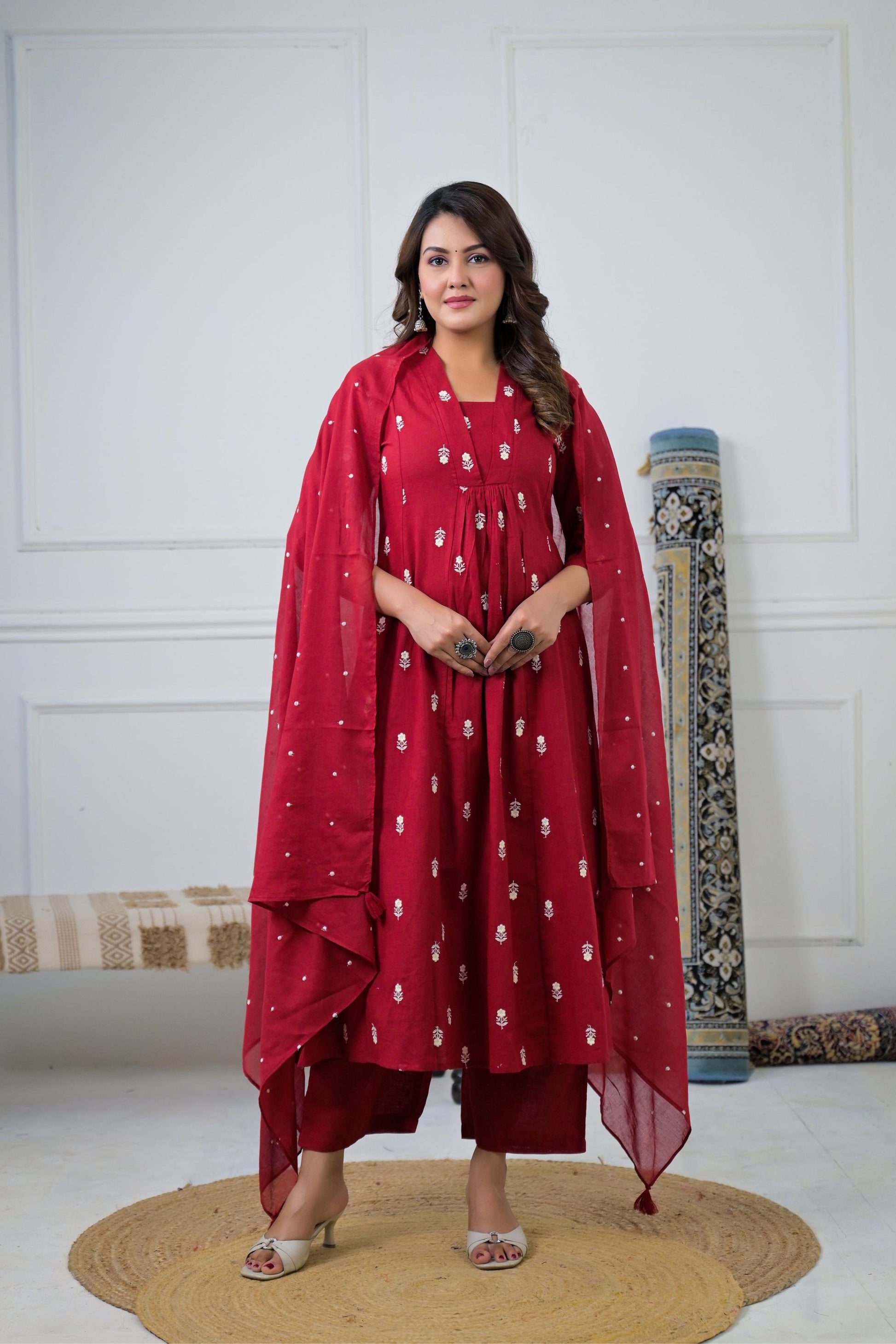 Wine Floral Embroidered Suit Set with intricate floral embroidery on a rich wine-colored fabric.