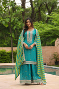 Festive Firozi Palaazo Suit Set with intricate embroidery and striped dupatta.