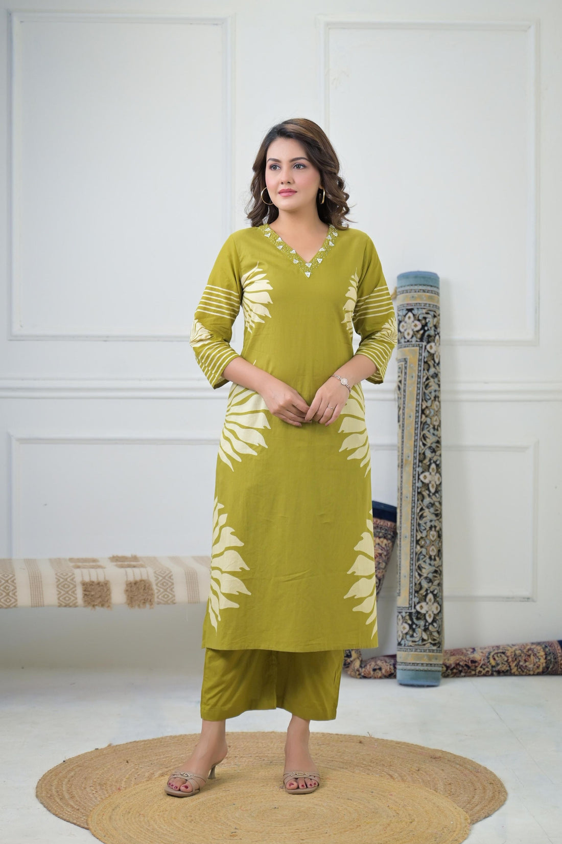 Elegant Leaf Printed Kurta Set, featuring a detailed green leaf print on a cream-colored kurta and matching pants.