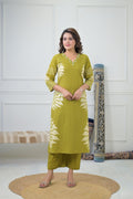 Elegant Leaf Printed Kurta Set, featuring a detailed green leaf print on a cream-colored kurta and matching pants.