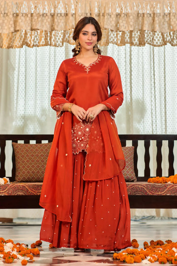 Orange color with chiffon fabric Floral Embroidered Regular Kurta with Sharara & Dupatta