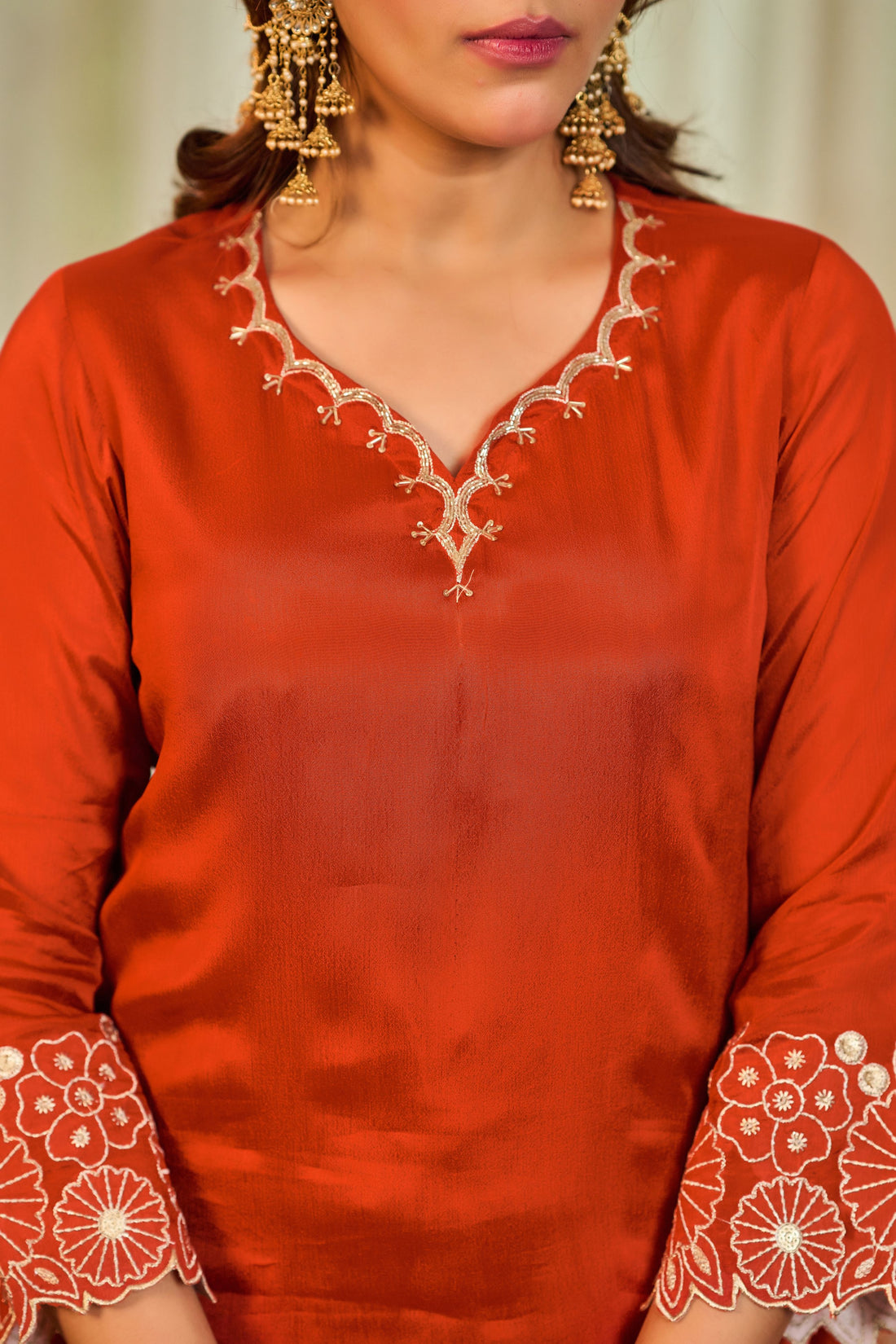 Orange color with chiffon fabric Floral Embroidered Regular Kurta with Sharara & Dupatta