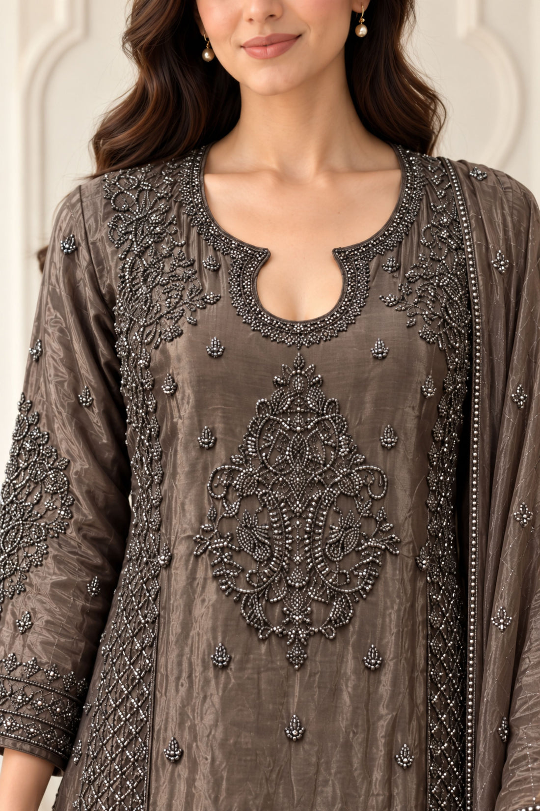 Grey color with crepe fabric Embellished A-Line Kurta with Pants & Dupatta