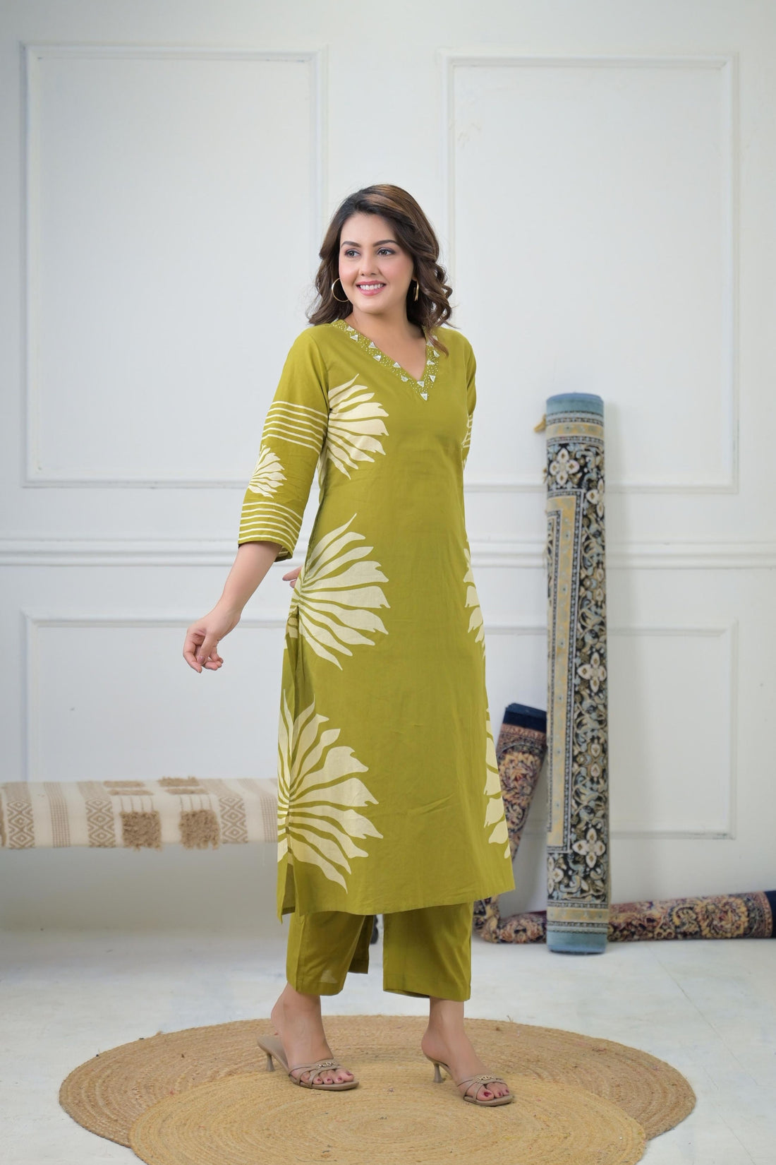 Elegant Leaf Printed Kurta Set, featuring a detailed green leaf print on a cream-colored kurta and matching pants.