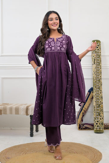 Embroidered kurta set with dupatta, featuring intricate floral embroidery on a vibrant fabric.