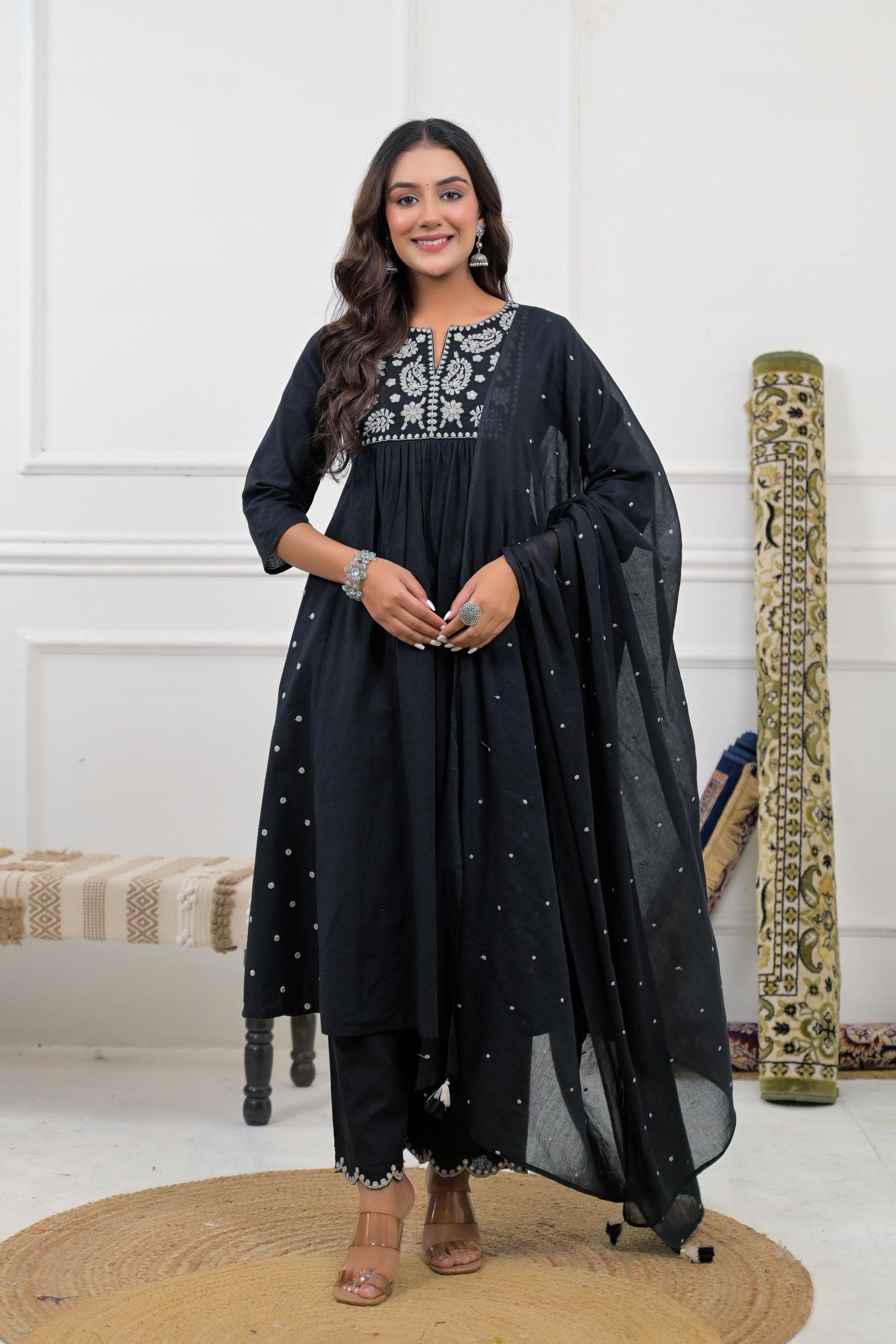 Embroidered Kurta Set with Embroidered Dupatta featuring intricate floral patterns on a vibrant fabric.