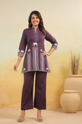 Elephant motif printed kurta set for women in a vibrant red hue, featuring intricate elephant designs and a matching dupatta.